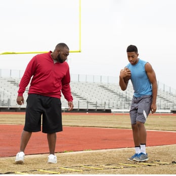 coach-training-a-high-school-athlete-for-football.jpg_s=1024x1024&w=is&k=20&c=ImnZNA7BfM9aduubJ-ff97t7J5PJf9MScGmDGvh3ydo=